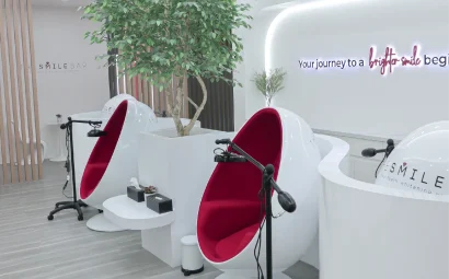 Interior lounge of The Smile Bar Bonifacio Stopover Pavilion with modern whitening chairs