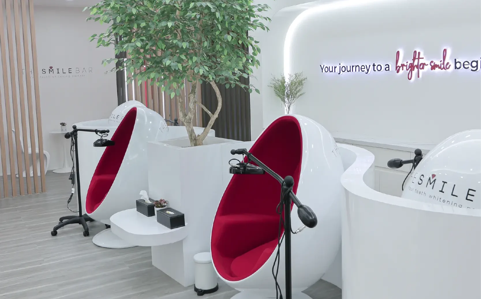 Interior lounge of The Smile Bar Bonifacio Stopover Pavilion with modern whitening chairs