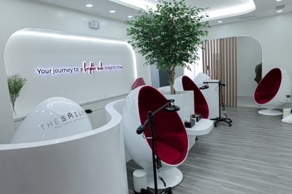 Interior lounge of The Smile Bar Bonifacio Stopover Pavilion with modern whitening chairs